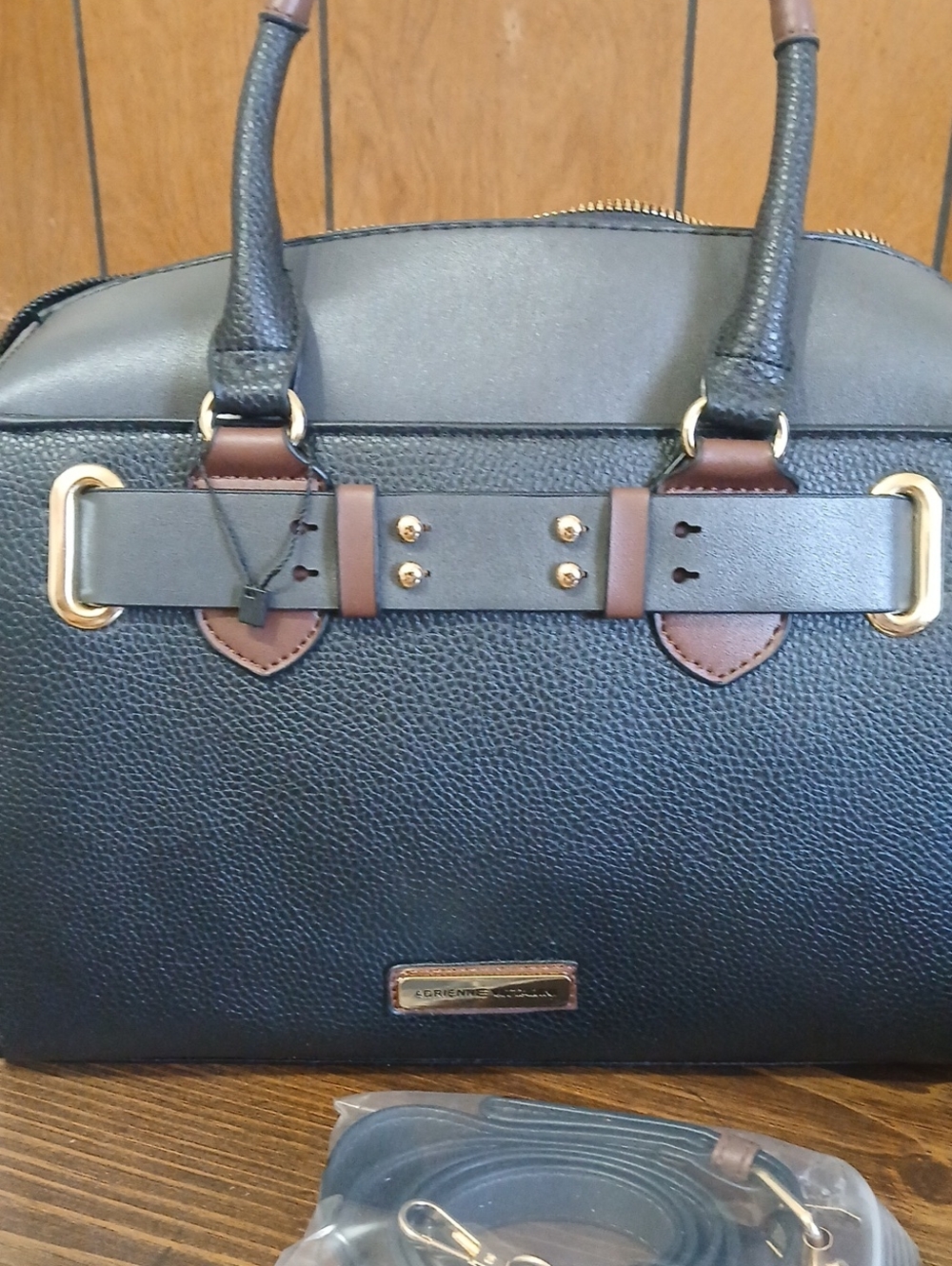 Adrienne Vittadini satchel handbag is made of black and brown